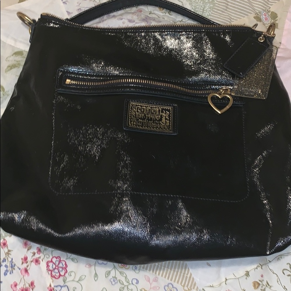 Coach Poppy in black with crossbody adj strap